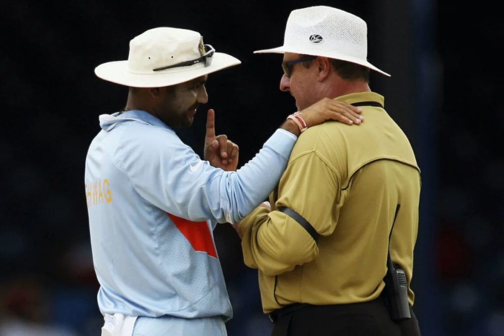 Virender Sehwag with umpire Ian Howell