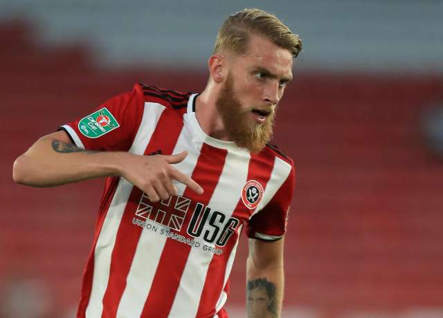 Sheffield United's Oli McBurnie attacks a fan